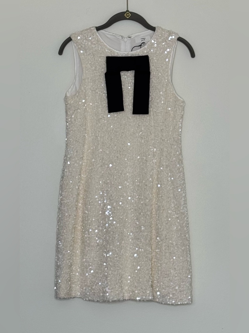Sequined Cream/White Mini Dress with Black Bow Accent